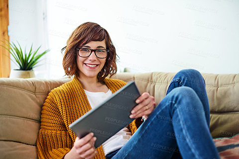 Stock photo of women holding tablet